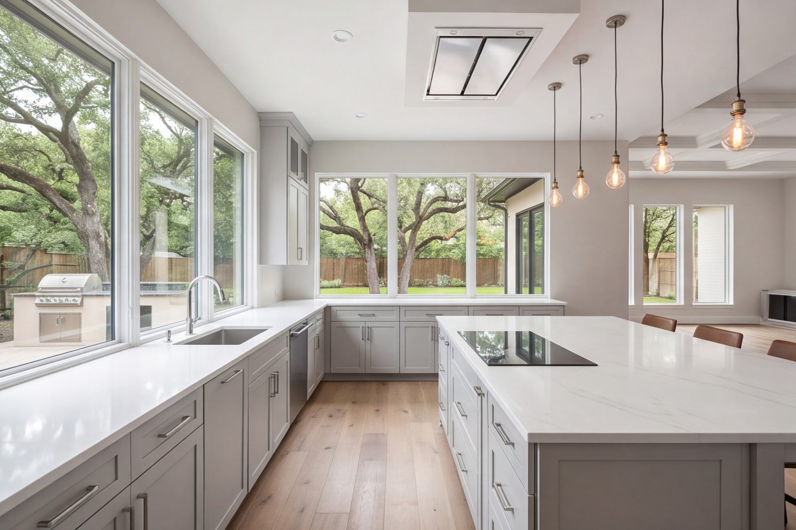 Energy Corridor open-plan kitchen with long counters and a breakfast bar